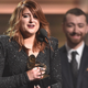Real love: Sam Smith beams as Meghan Trainor accepts Best New Artist at the 2016 Grammys